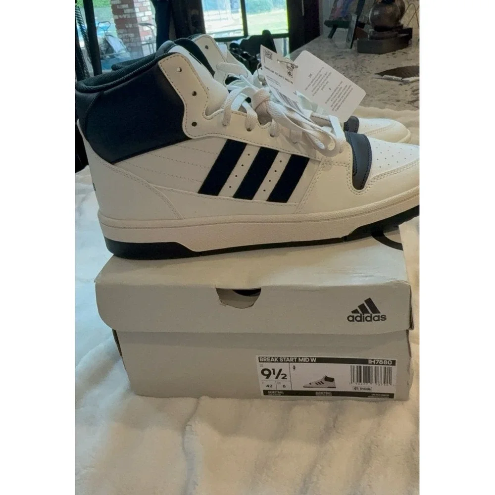 Womens 9.5 ADIDAS Break start Mid basketball shoes.  white/black/cloud white